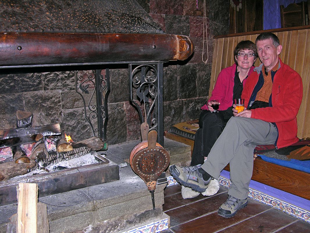 Ecuador Chimborazo 02-07 Charlotte Ryan and Jerome Ryan Sitting Next To Fireplace At Estrella del Chimborazo